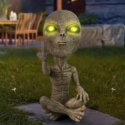 Lopoti Solar Light Alien Statue front view glowing softly for whimsical garden decor.