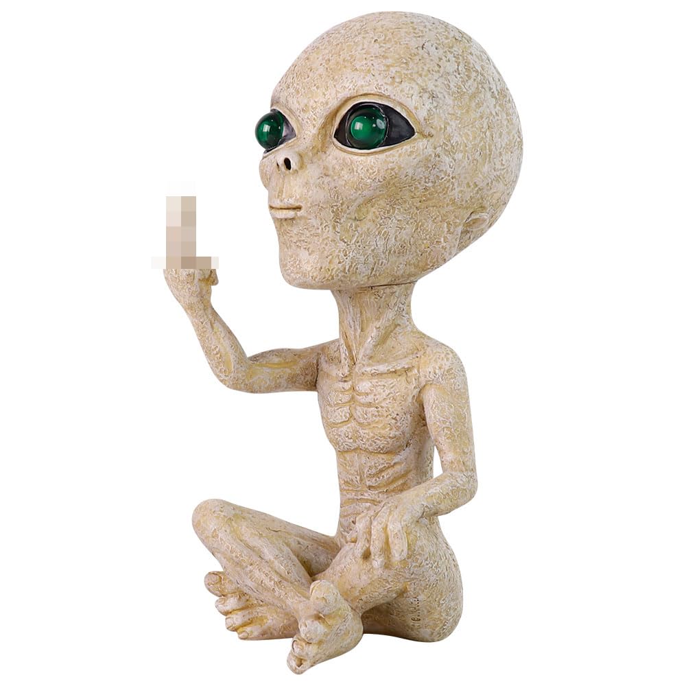 Lopoti Solar Light Alien Statue placed in an outdoor garden setting.