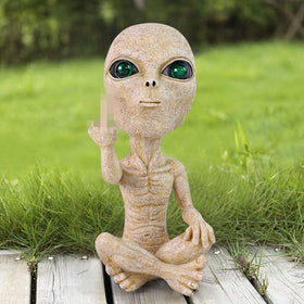 Lopoti Solar Light Alien Statue side profile highlighting compact design.