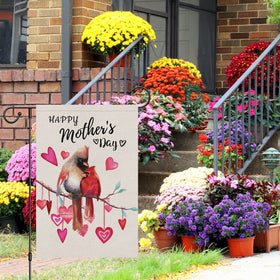 Louise Maelys burlap material supports weather-ready outdoor display.