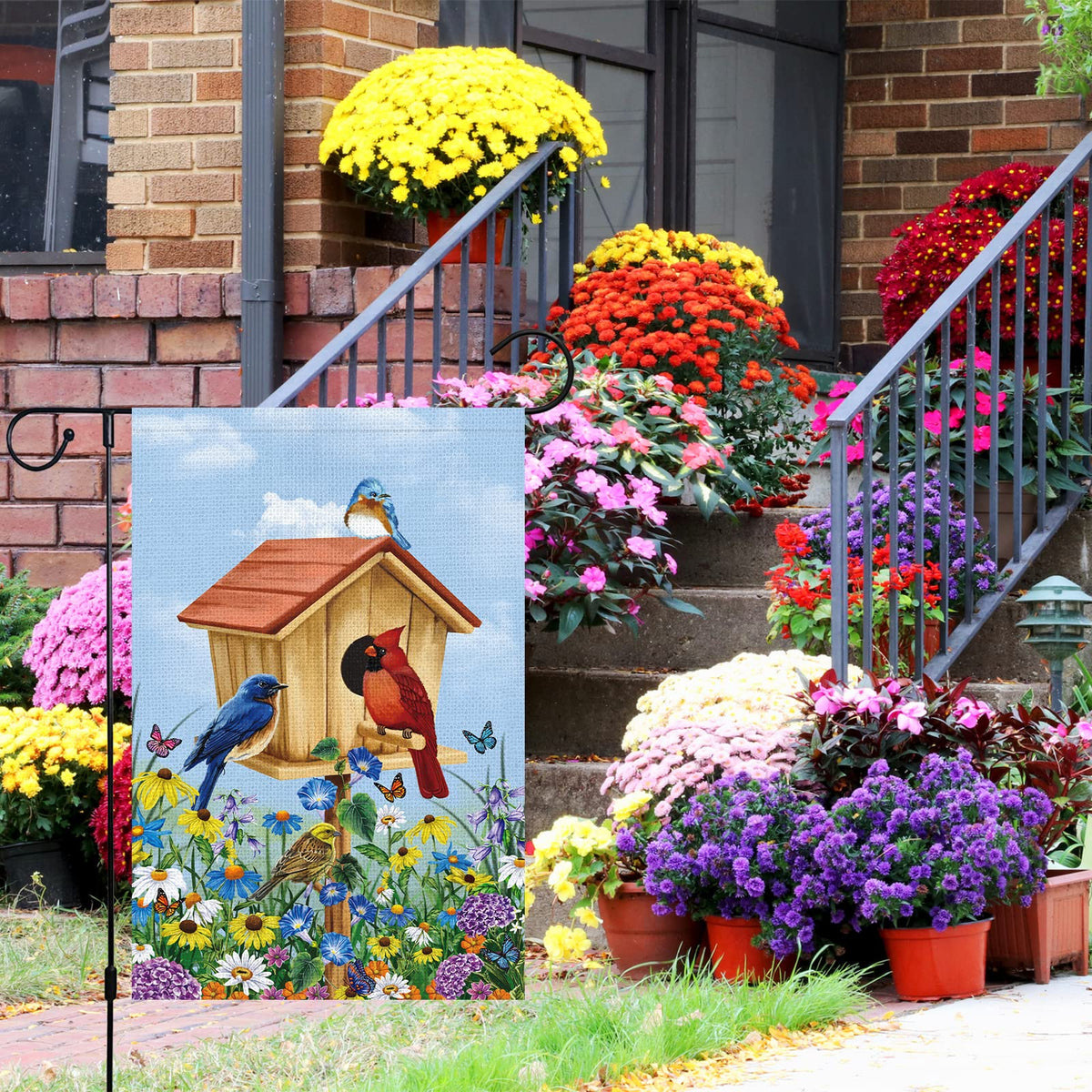 Louise Maelys burlap spring garden flag emphasizes durable, weather-ready material for year-round outdoor use.