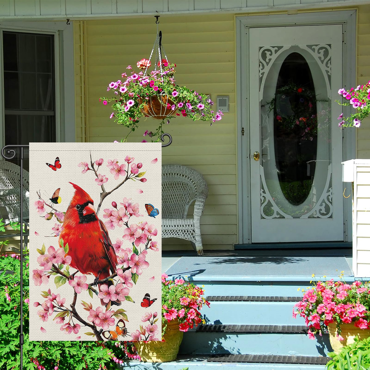 Louise Maelys cardinal-butterfly-tree flag add seasonal charm to porches.