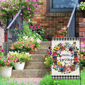 Louise Maelys Hello Spring flag with pansy and butterfly seen from another angle outdoors.