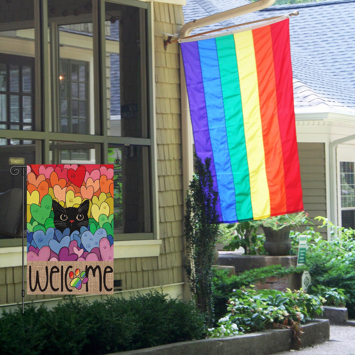Louise Maelys Pride flag displays rainbow hearts for front yard visibility and inclusivity
