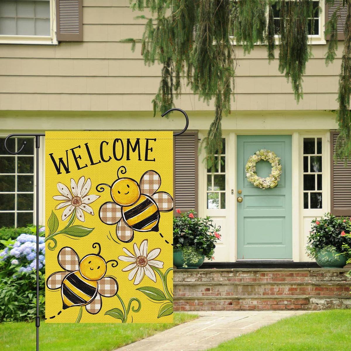 Louise Maelys double-sided garden flag ensures readable messaging from both sides.
