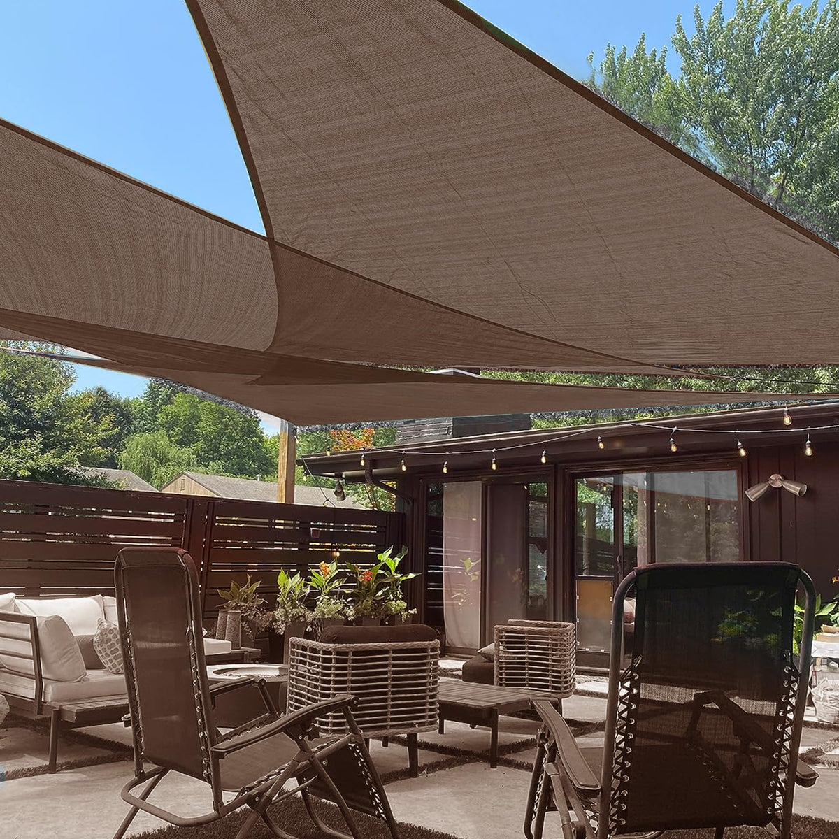 LOVE STORY 12x12 triangle brown shade sail blocks sun on outdoor patios.