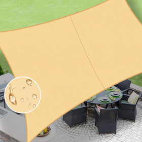 Love Story shade sail 10x13 in sand provides patio sun shade.