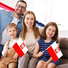 LoveVC assembly-required wooden poles support waving flags.