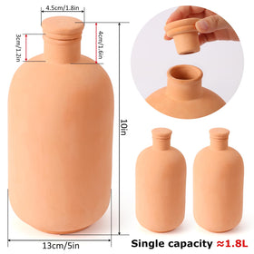 Lovely Ran Ollas terracotta watering ball with lid ready for refilling and use.