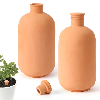 Lovely Ran Ollas terracotta watering pot 10x5in buried in soil delivers steady moisture.