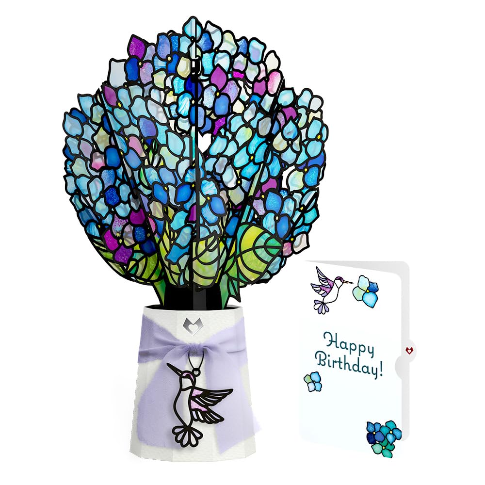 Lovepop birthday suncatcher bouquet glows softly as a desk centerpiece.