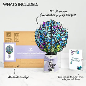 Lovepop sunlit hydrangeas bouquet reveals blue, teal, violet tones in light.