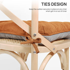 Love's cabin chair cushion being wiped clean demonstrates easy maintenance.