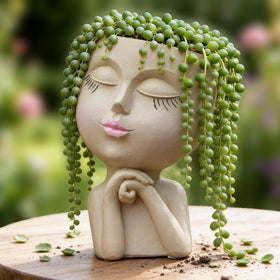 LovTocTic face planter head with drainage hole for healthy small plants.