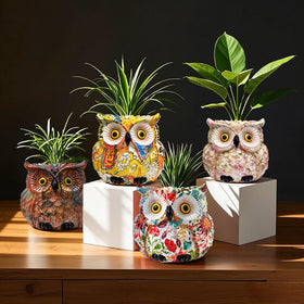 LovTocTic owl planter perched on a shelf as decor.