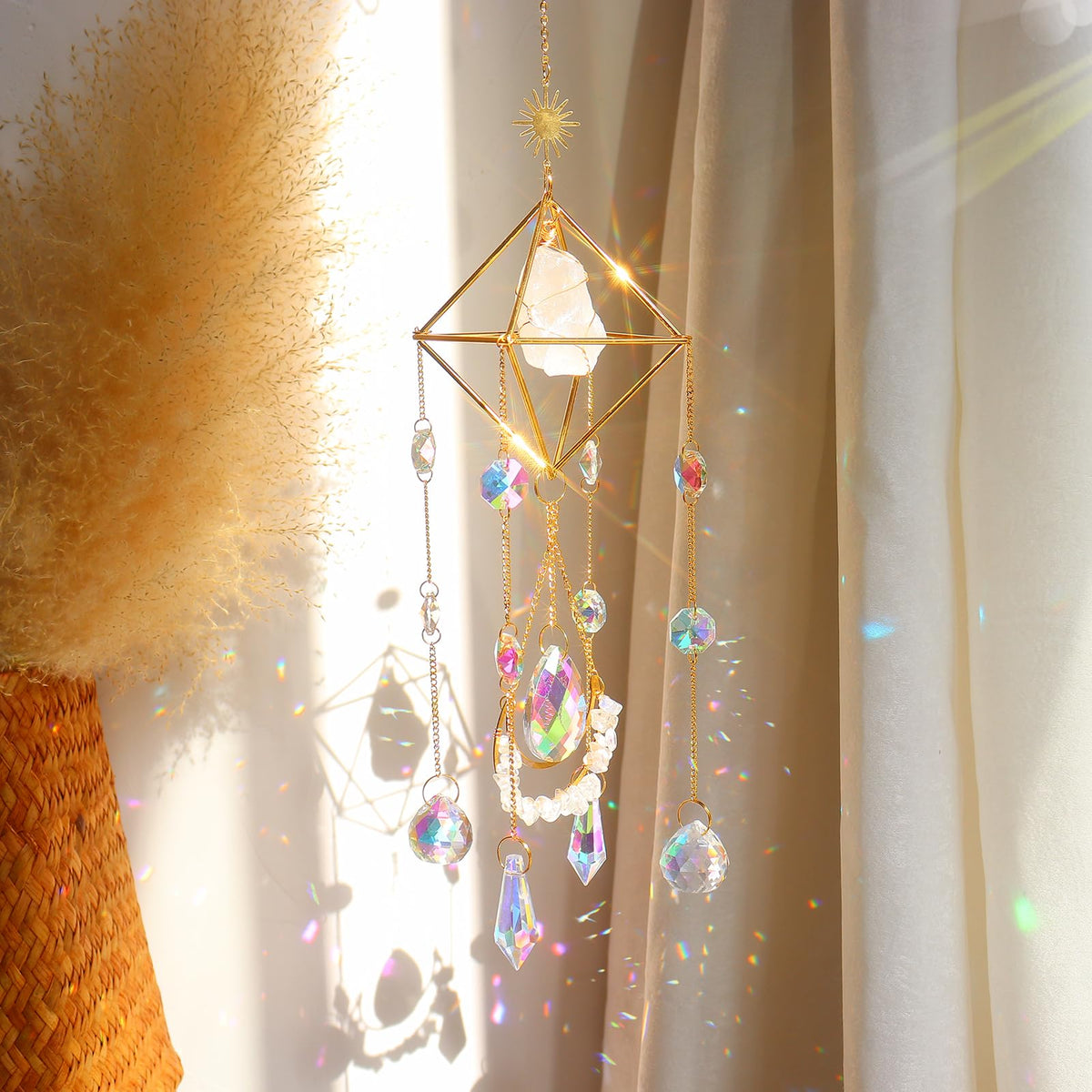 LPKADQA Rose Quartz Suncatcher hanging in the window, catching sun to cast calming rainbows for home decor.