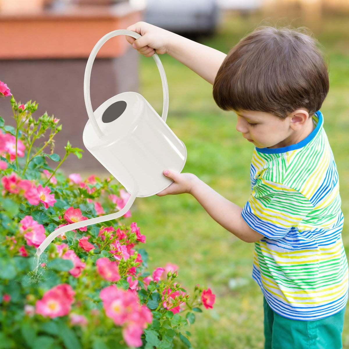 LTSUMI long-spout watering can near leaves and pots for precise pours.