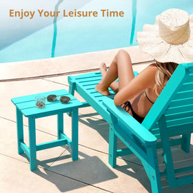 LUE BONA Aruba Blue table beside Adirondack chair for relaxed seating.