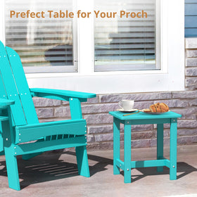 LUE BONA Aruba Blue table on a deck, ready for outdoor lounging.