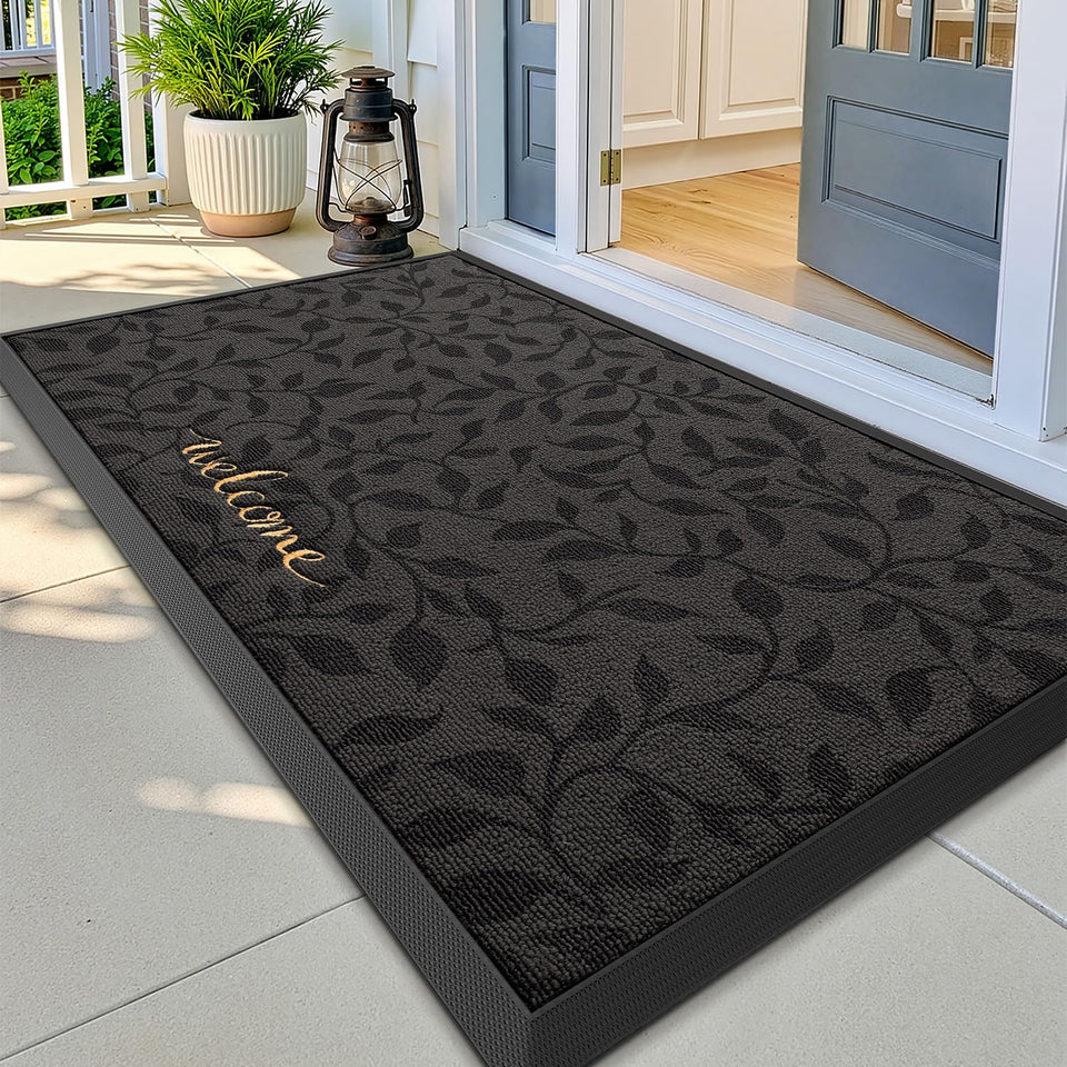LUMI premium front door mat close-up showing tree embroidery and detail