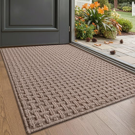 LUMI door mat with grid texture traps moisture at the indoor entrance