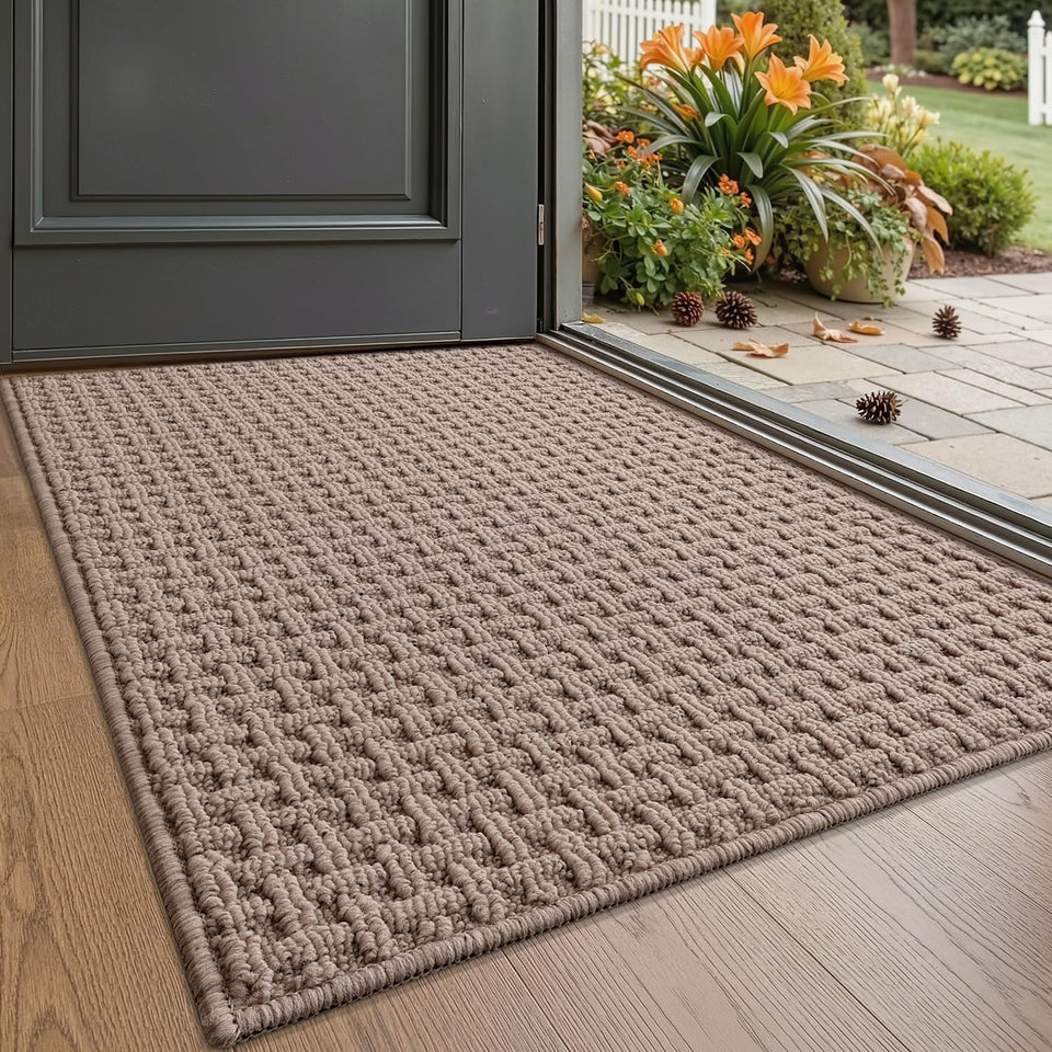 LUMI door mat with grid texture traps moisture at the indoor entrance