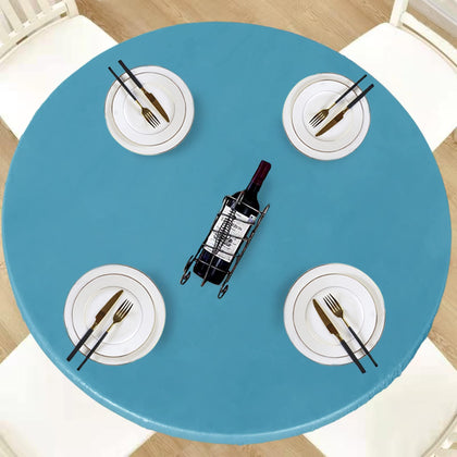 LUSHVIDA round elastic-edge teal table cover protects a round table from spills.