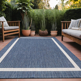 Luul Home bordered outdoor rug 8x10 blue enhances patio spaces with durable style