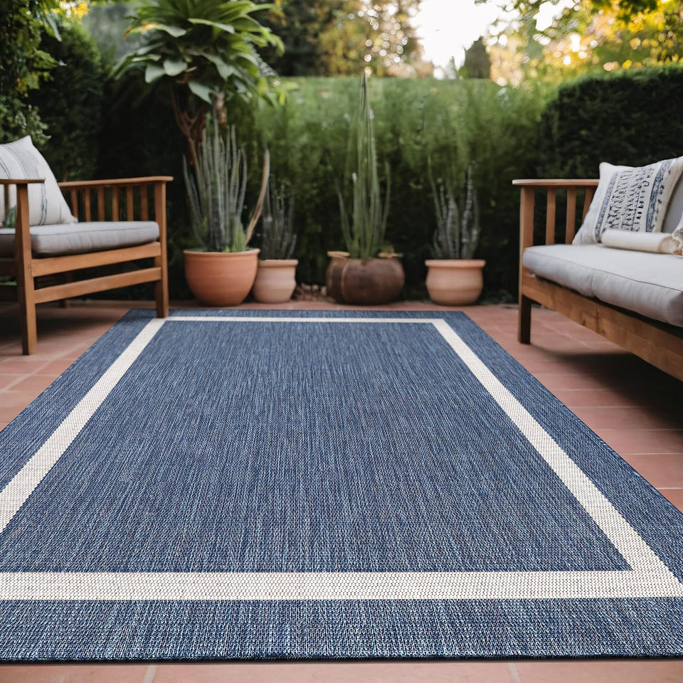 Luul Home bordered outdoor rug 8x10 blue enhances patio spaces with durable style
