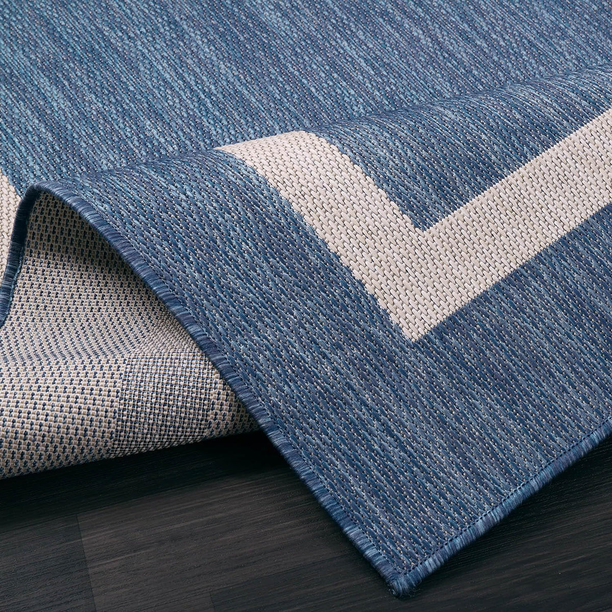 Close-up weave of Luul Home 8x10 blue rug shows sturdy fibers and tight construction