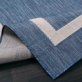 Close-up weave of Luul Home 8x10 blue rug shows sturdy fibers and tight construction