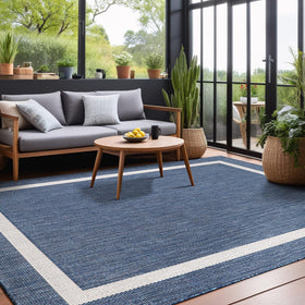 Non-shedding edges keep blue rug looking tidy in busy entryways