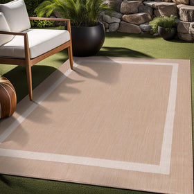 Luul Home bordered outdoor rug 9x12 soft beige tones, comfortable underfoot.