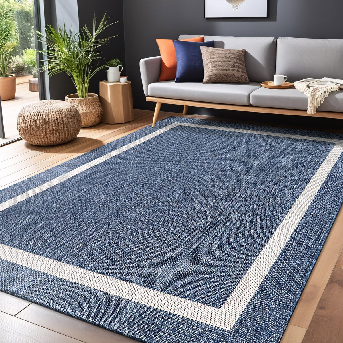 Luul Home patio setup featuring blue outdoor rug for inviting curb appeal