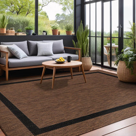Luul Home textured border rug withstands wear while elevating entrances.