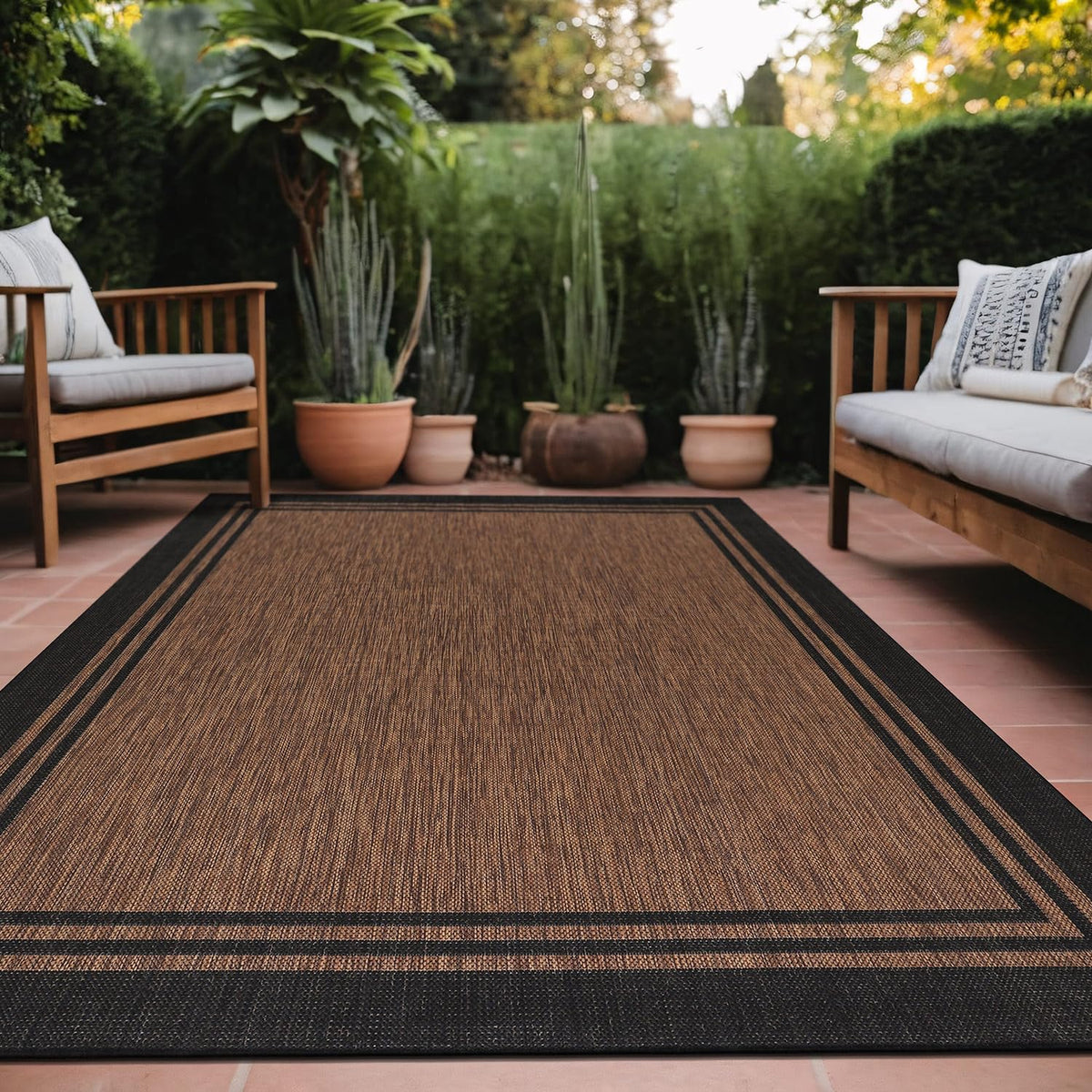Luul Home bordered outdoor rug 8x10 on patio adds style while remaining washable.