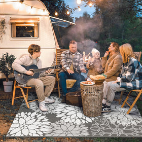LuxStep Reversible Design rug offers two floral sides for versatile outdoor styling