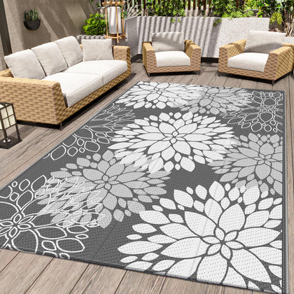 LuxStep Waterproof Outdoor Rug shows easy rinsing for patios and camps