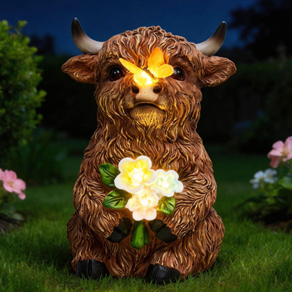 LXOUMEI Solar Highland Cow with butterfly on nose, perfect for magical garden evenings