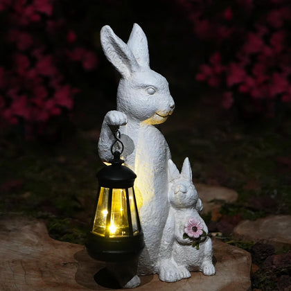 LXOUMEI solar outdoor statues bunny lantern highlights charm and glowing ambiance for evenings.