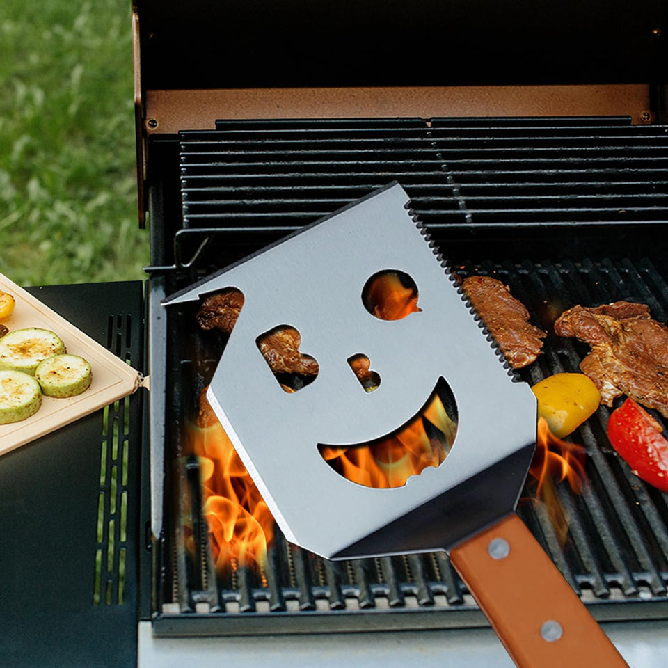 M-HHonger smiling-face spatula for lively barbecues and party-ready grilling moments.