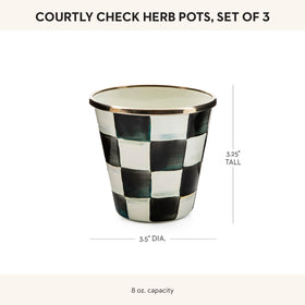 MacKenzie-Childs compact indoor planters on a modern kitchen counter with herbs.