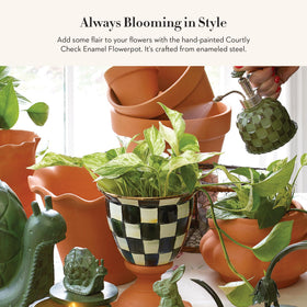 MacKenzie-Childs planter in Courtly Check complements any decor.