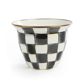 MacKenzie-Childs flowerpot with bronzed rim for elegant indoor display.
