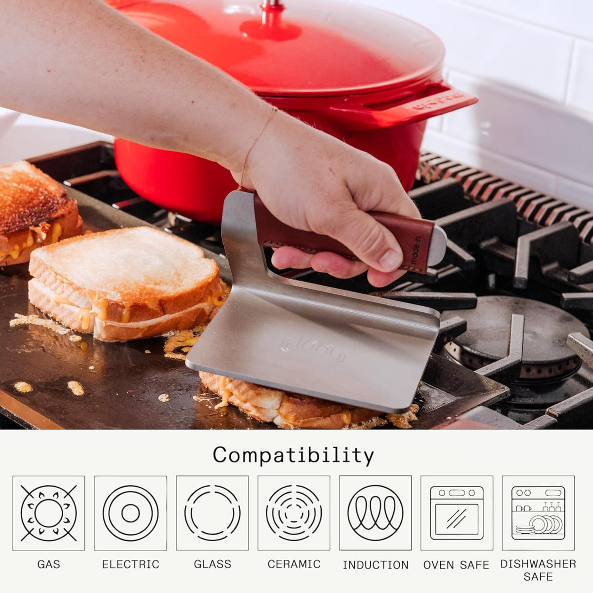 Made In grill press shown in open-fire setup for high-heat cooking