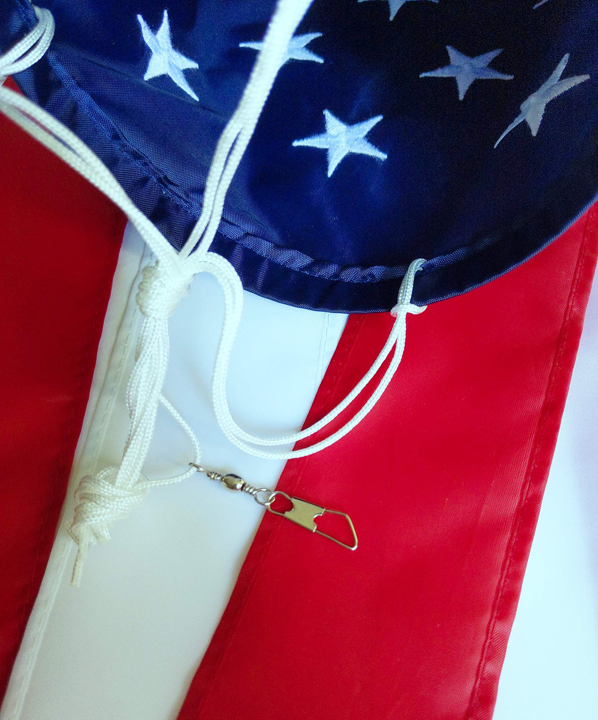 Madrona Brands metal swivel clasp keeps windsock securely mounted.