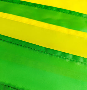 Madrona Brands Sunflower Windsock yard decor enhances garden charm.