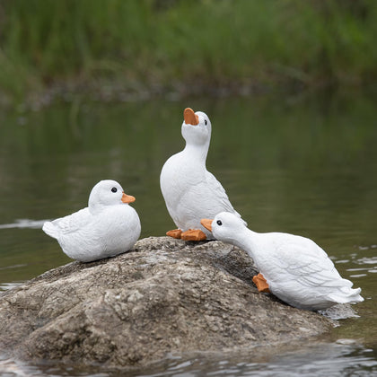 Mageeki duck statue in garden offers lifelike charm and outdoor durability.