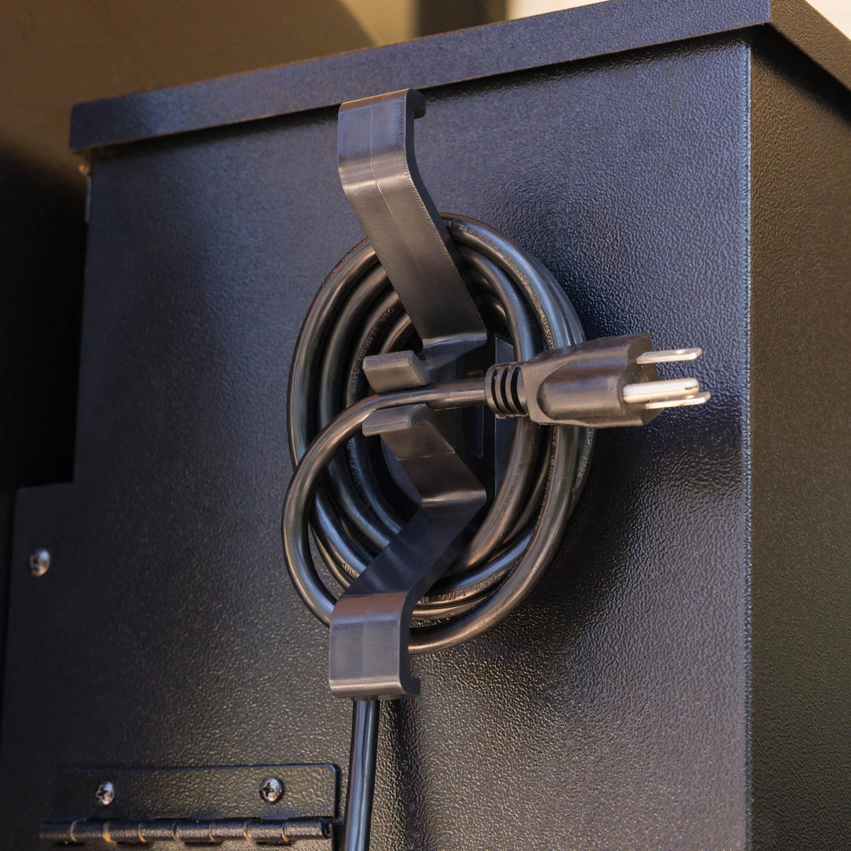 Magna Outdoors cord organizer magnet clip for pellet grill keeps cords tidy and accessible.
