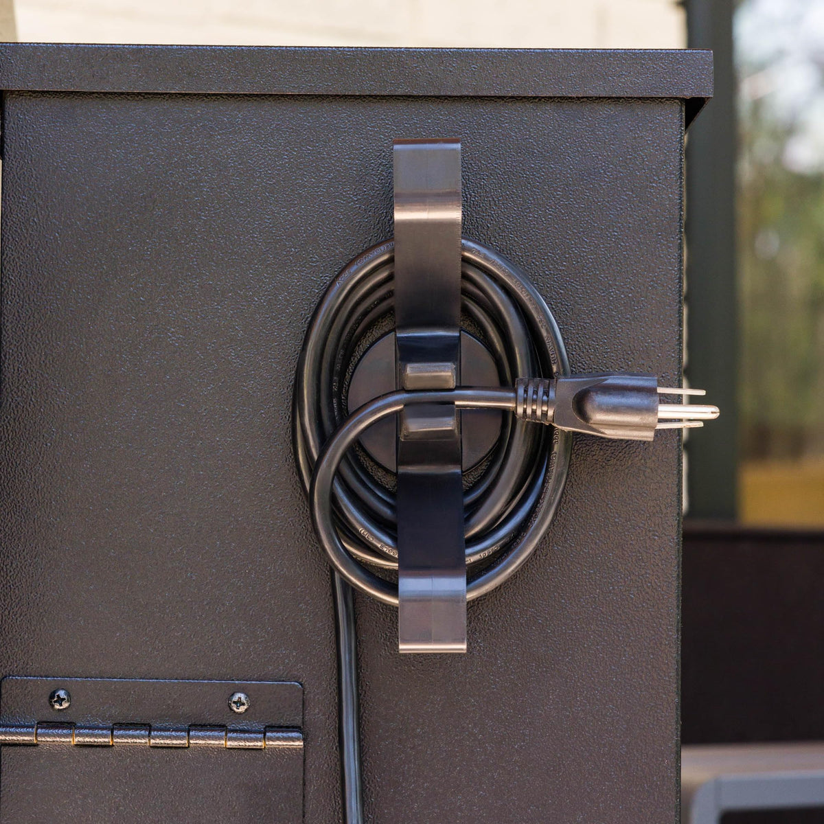 Magna Outdoors pellet grill magnetic cord wrap neatly secures power cord during cooking sessions.